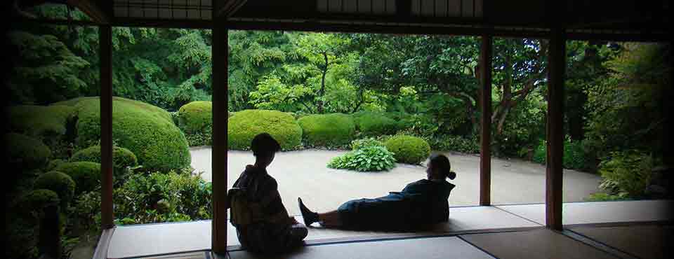 a Kimono couple relax at the Shisendo with a garden view